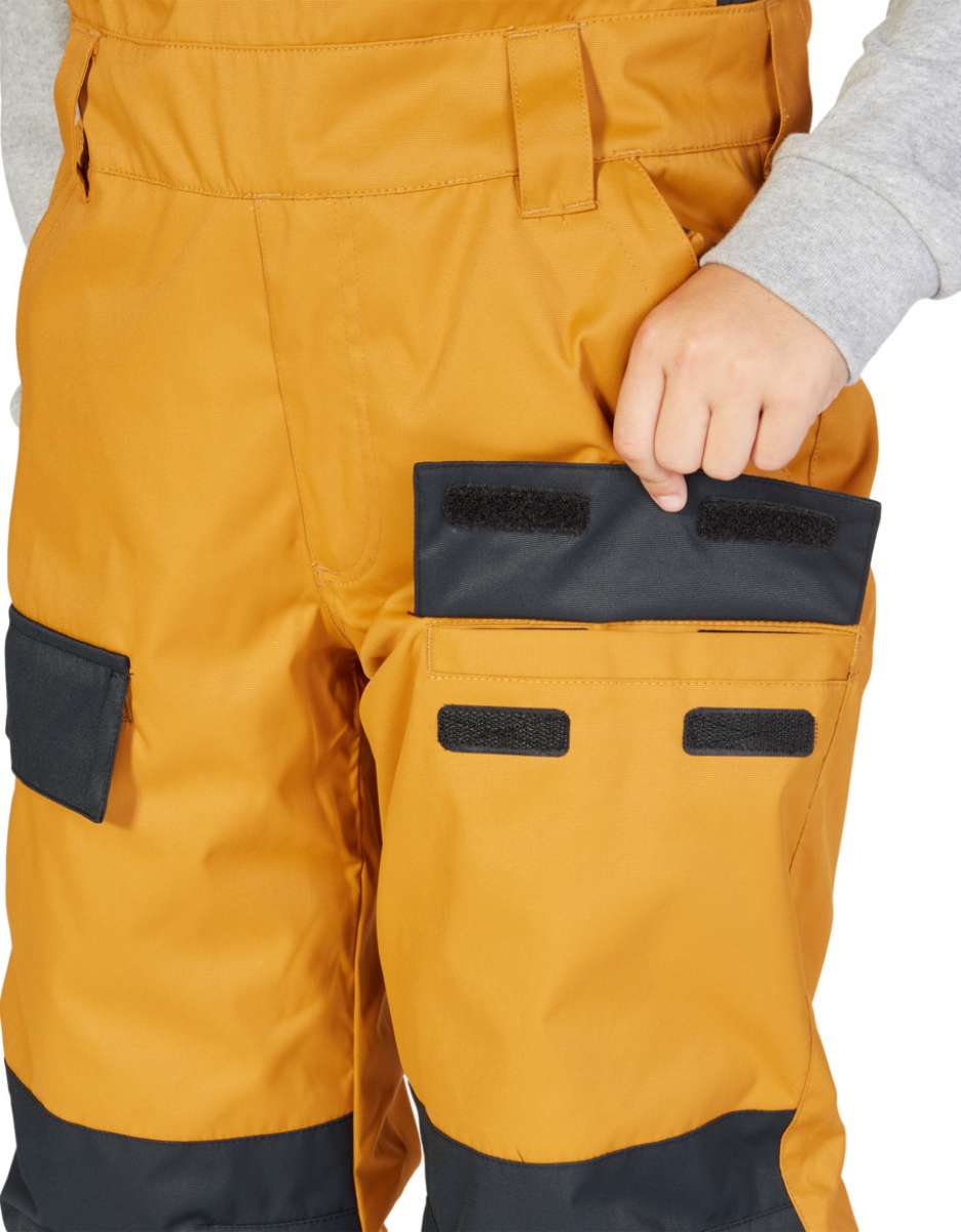 DC Juniors Roadblock Bib 2023 - Black bib with white DC logo on left thigh and black zipper down center front.