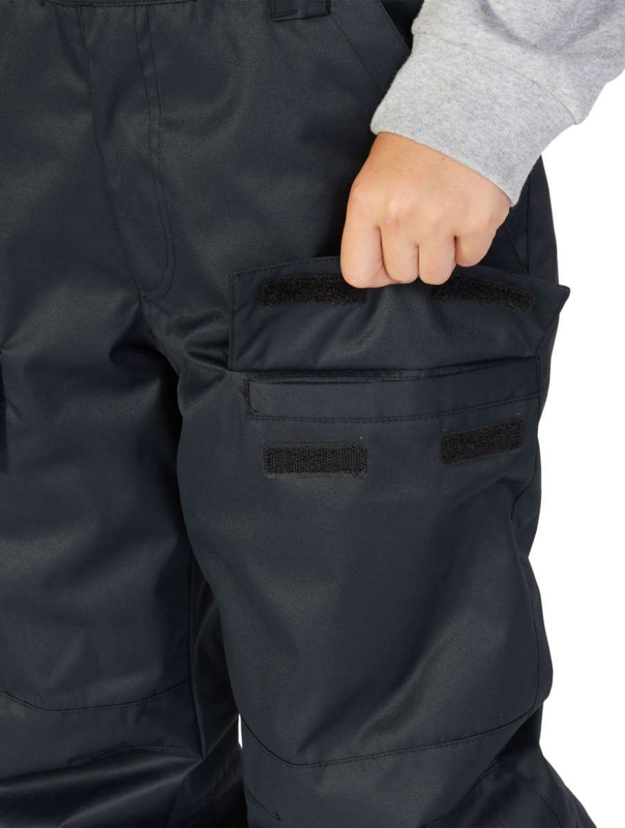 DC Juniors Roadblock Bib 2023 - Black bib with a white DC logo on the left leg and black straps.