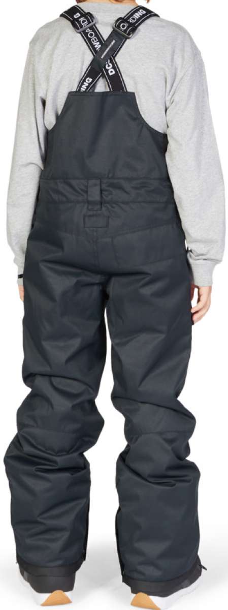 DC Juniors Roadblock Bib 2023 - Black bib with white DC logo on left leg and black straps with white "DC" lettering.