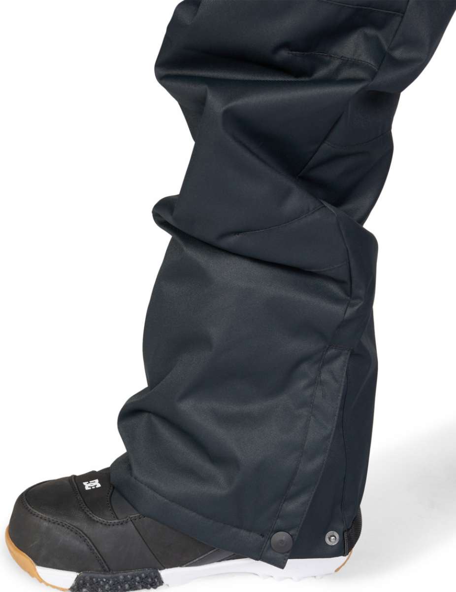 DC Juniors Roadblock Bib 2023 - Black bib pants with a white logo on the left leg.