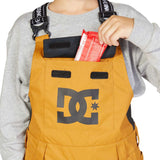 DC Juniors Roadblock Bib 2023 - A pair of bib snow pants with a black and white geometric pattern on the left leg.