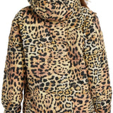DC Women's Nexus Reversible Anorak Jacket 2024 - A black and white leopard print jacket with a hood, worn by a model from behind.