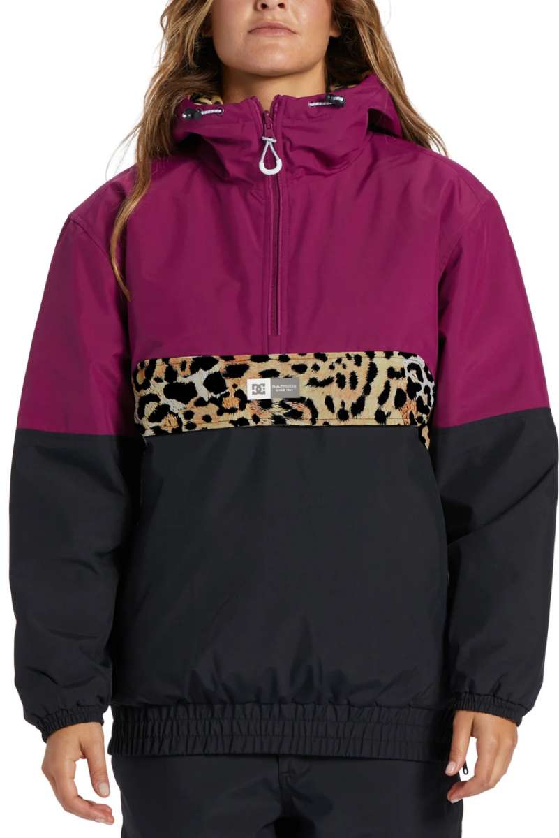 DC Women's Nexus Reversible Anorak Jacket 2024 - A reversible jacket with a leopard print on one side and solid color on the other, featuring a zipper closure.