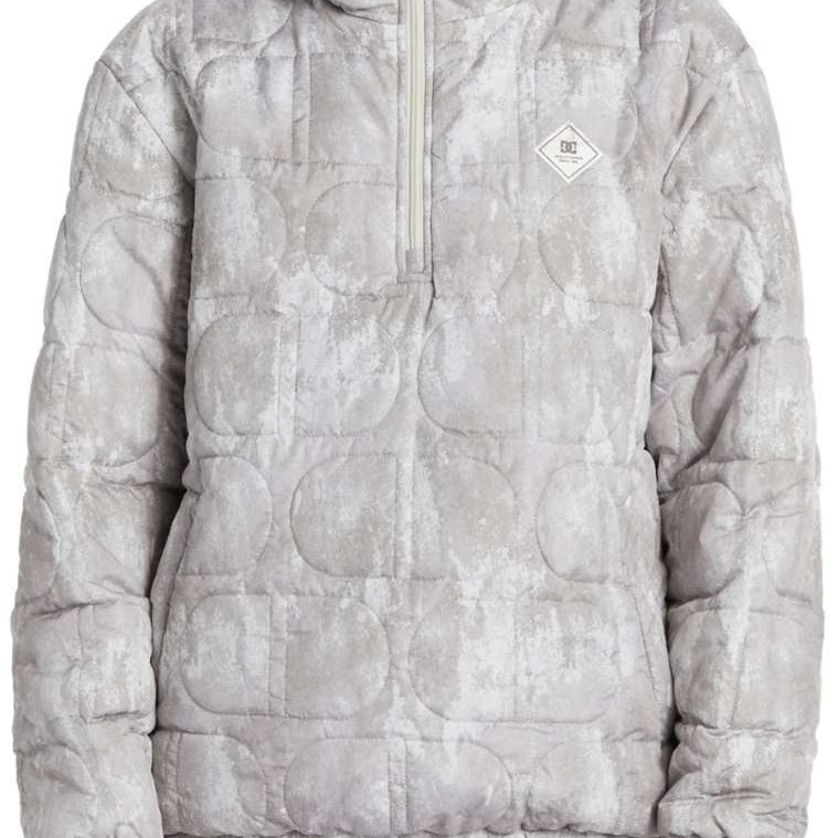 DC Women's Nexus Reversible Anorak Jacket 2024 - A light gray jacket with a subtle pattern of darker gray circles, featuring a hood and a zipper down the front.