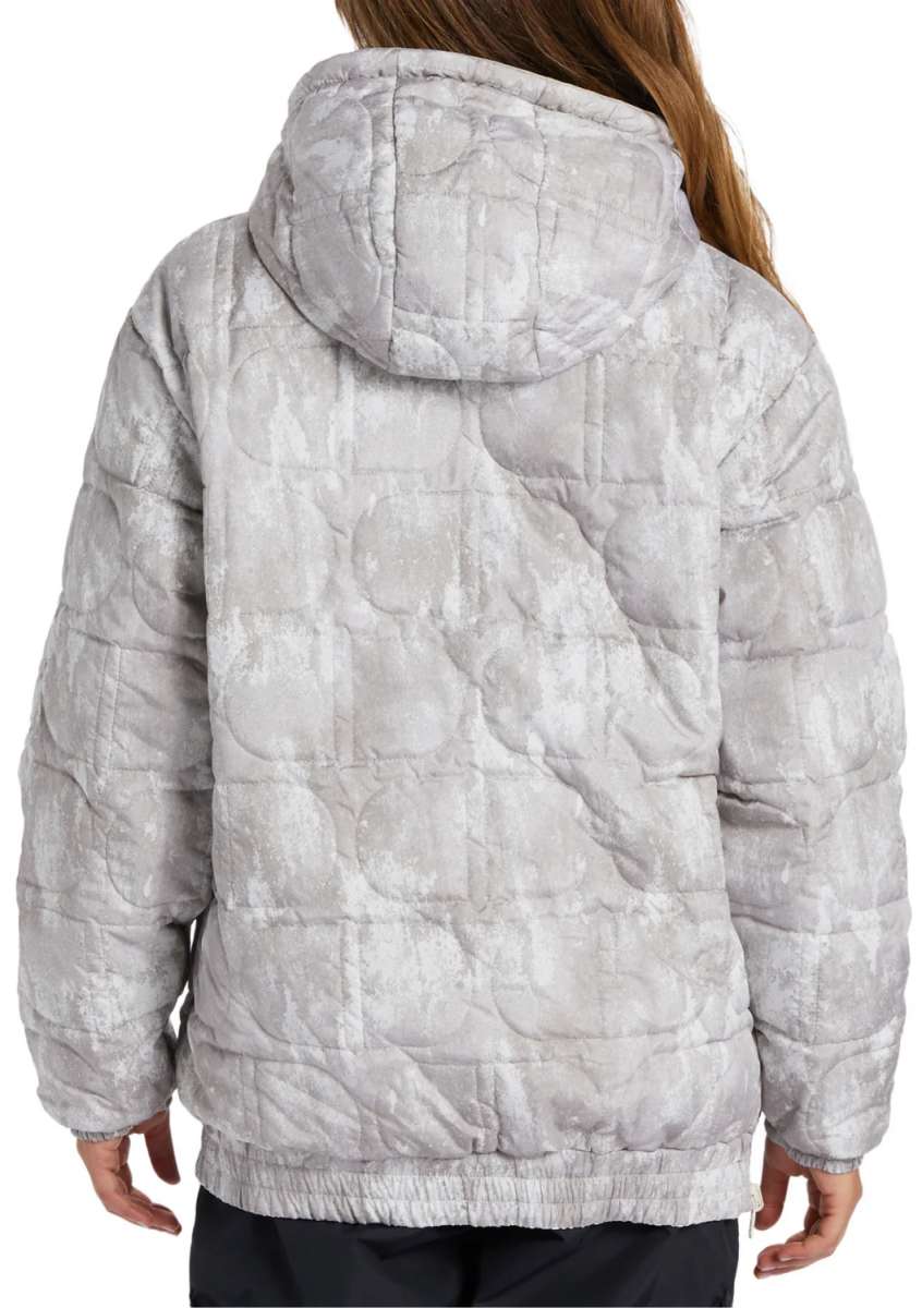 DC Women's Nexus Reversible Anorak Jacket 2024 - A light gray jacket with a subtle pattern of darker gray lines and circles, featuring a hood and zippered pockets on both sides.