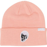 DC Women's Andy Warhol Label Beanie 2024 - A light pink beanie with a black and white Andy Warhol skull logo on the front.