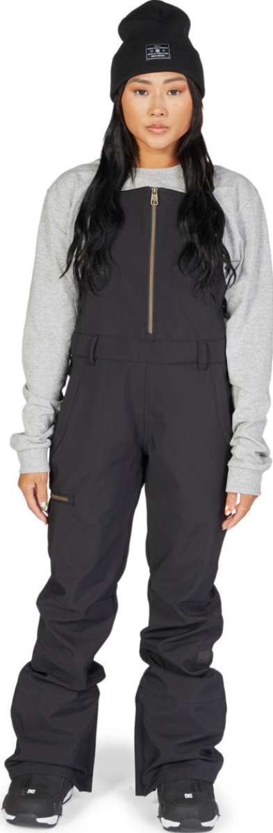 DC Women's Collective Shell Bib 2023 - Black bib with gold zipper, black straps and buckles on waist.