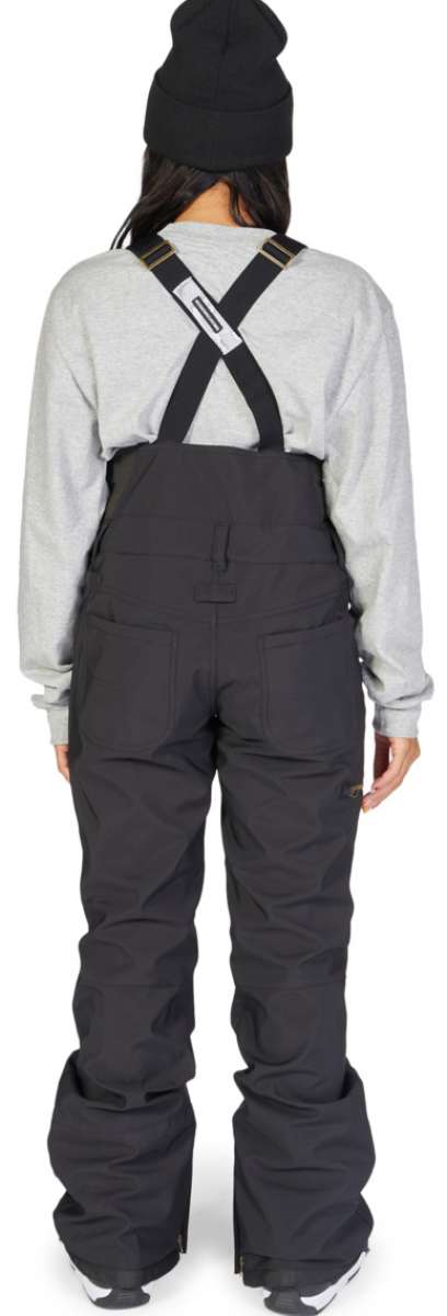 DC Women's Collective Shell Bib 2023 - Black bib with gold buckles and black suspenders.