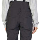 DC Women's Collective Shell Bib 2023 - Black bib with gold buckles and black suspenders.