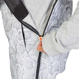 DC Women's Collective Shell Bib 2023 - Black bib with white geometric pattern and black zipper on left side.