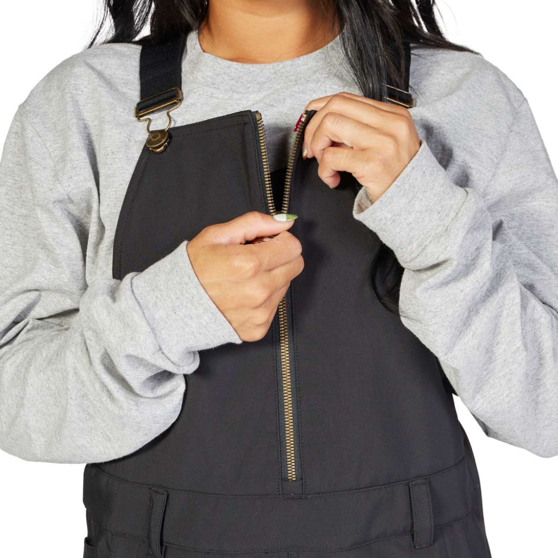 DC Women's Collective Shell Bib 2023 - Black bib overalls with a zippered front and adjustable straps.