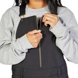 DC Women's Collective Shell Bib 2023 - Black bib overalls with a zippered front and adjustable straps.
