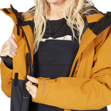 DC Women's Cruiser Insulated Jacket 2023 - A black jacket with a white logo on the chest and a zippered pocket on the side.