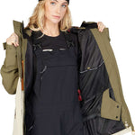 DC Women's Cruiser Insulated Jacket 2023 - A black jacket with a white zipper and two zippered pockets on the front.