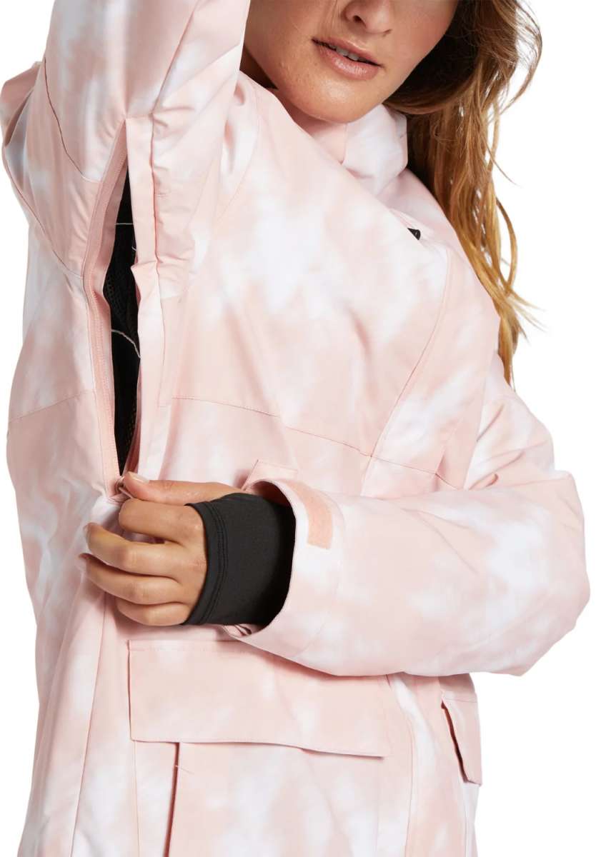 DC Women's Cruiser Insulated Jacket 2024 - A light pink jacket with a black zipper and two zippered pockets on either side.