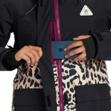 DC Women's Cruiser Insulated Jacket 2024 - A black jacket with a white logo on the left chest and a zipper down the front.