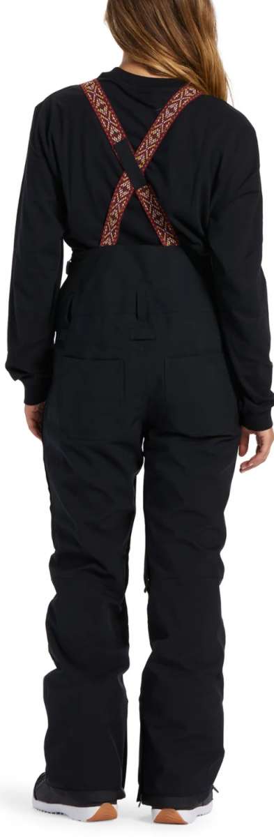 DC Women's Crusade Shell Bib Pant 2024 - Black bib pants with a geometric pattern on suspenders and black straps.