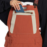 DC Women's Crusade Shell Bib Pant 2024 - Black bib with white trim and black snow skirt.