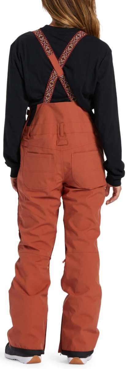 DC Women's Crusade Shell Bib Pant 2024 - Black bib with white trim and silver hardware, zippered leg pockets.