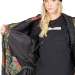 DC Women's Liberate Insulated Jacket 2023 - A black jacket with a floral pattern lining and a white logo on the chest.