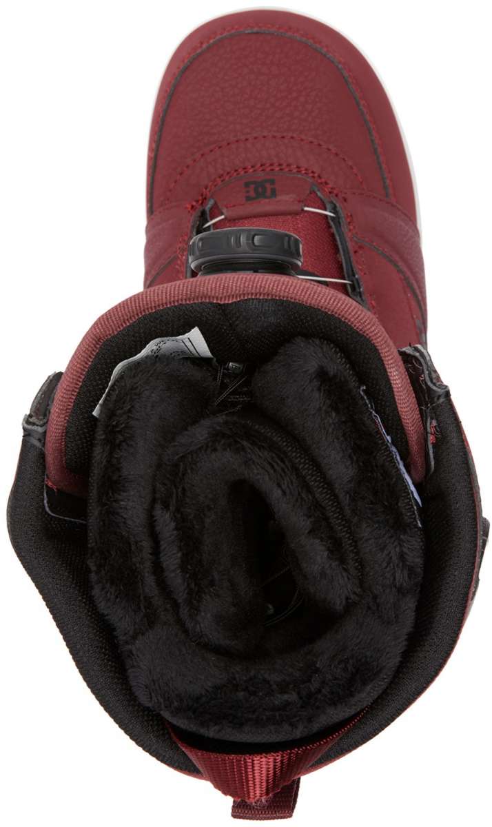 DC Women's Lotus BOA Snowboard Boots 2024 - A pair of red snowboard boots with a black strap and buckle on top.