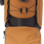 DC Women's Mora BOA Snowboard Boots 2024 - A pair of tan snowboard boots with a black fur lining visible inside.