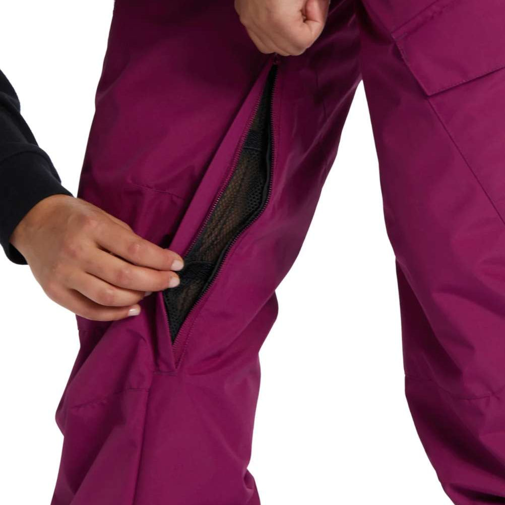 DC Women's Nonchalant Insulated Pant 2024 - Black insulated snow pants with a zippered pocket on the side of one leg.