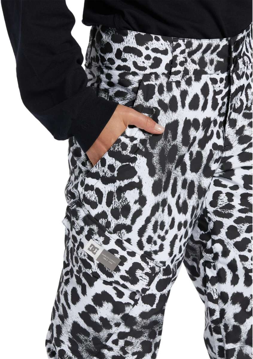DC Women's Nonchalant Insulated Pant 2024 - Black insulated snow pants with a subtle leopard pattern and zippered pockets.