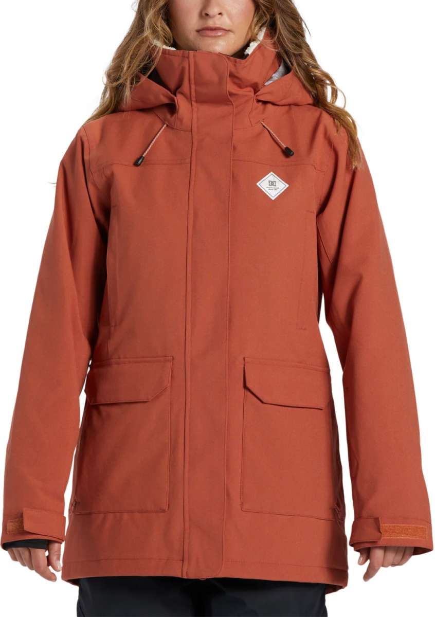 DC Women's Phoenix Insulated Parka 2024 - A salmon-colored parka with a hood and two zippered pockets on the front.