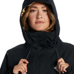 DC Women's Phoenix Insulated Parka 2024 - A black parka with a leopard print lining visible inside the hood.