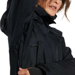 DC Women's Phoenix Insulated Parka 2024 - A black parka with a high collar and zippered pockets.