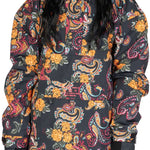 DC Women's Savvy Anorak Jacket 2023 - A black jacket with a paisley pattern featuring yellow, red, and blue accents.