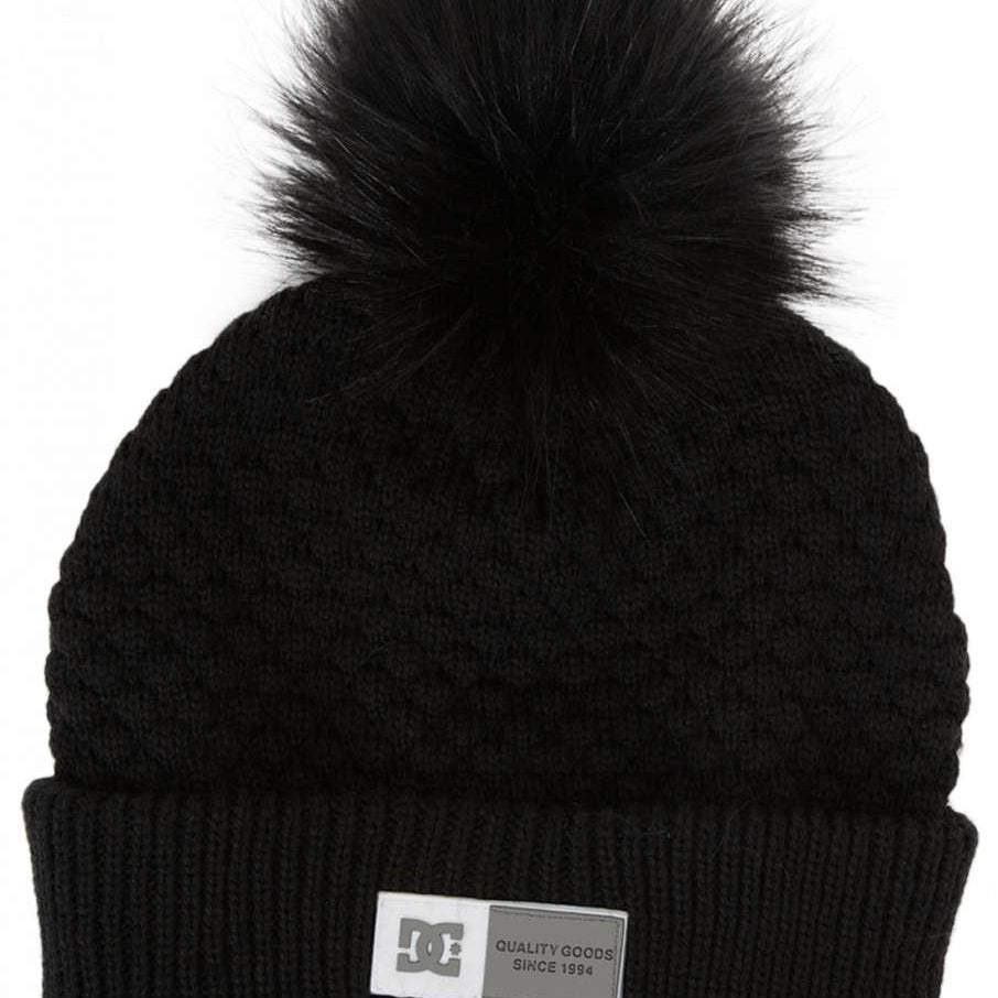 DC Women's Splendid Beanie 2024 - A black beanie with a large, fluffy pom-pom on top.