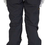 DC Women's Viva Shell Pant 2023 - Black snow pants with a zippered pocket on the right thigh and a small brown logo near the bottom left leg.