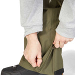 DC Women's Viva Shell Pant 2023 - Olive green pants with a zippered ankle and side pockets.