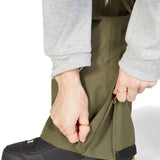 DC Women's Viva Shell Pant 2023 - Olive green pants with a zippered ankle and side pockets.