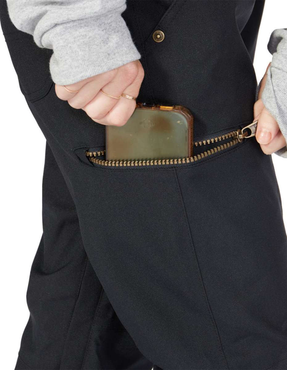 DC Women's Viva Shell Pant 2023 - Black pants with a subtle white pattern on the side of the leg.