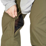 DC Women's Viva Shell Pant 2023 - Olive green pants with a zippered pocket on the thigh and a mesh lining visible through the zipper opening.