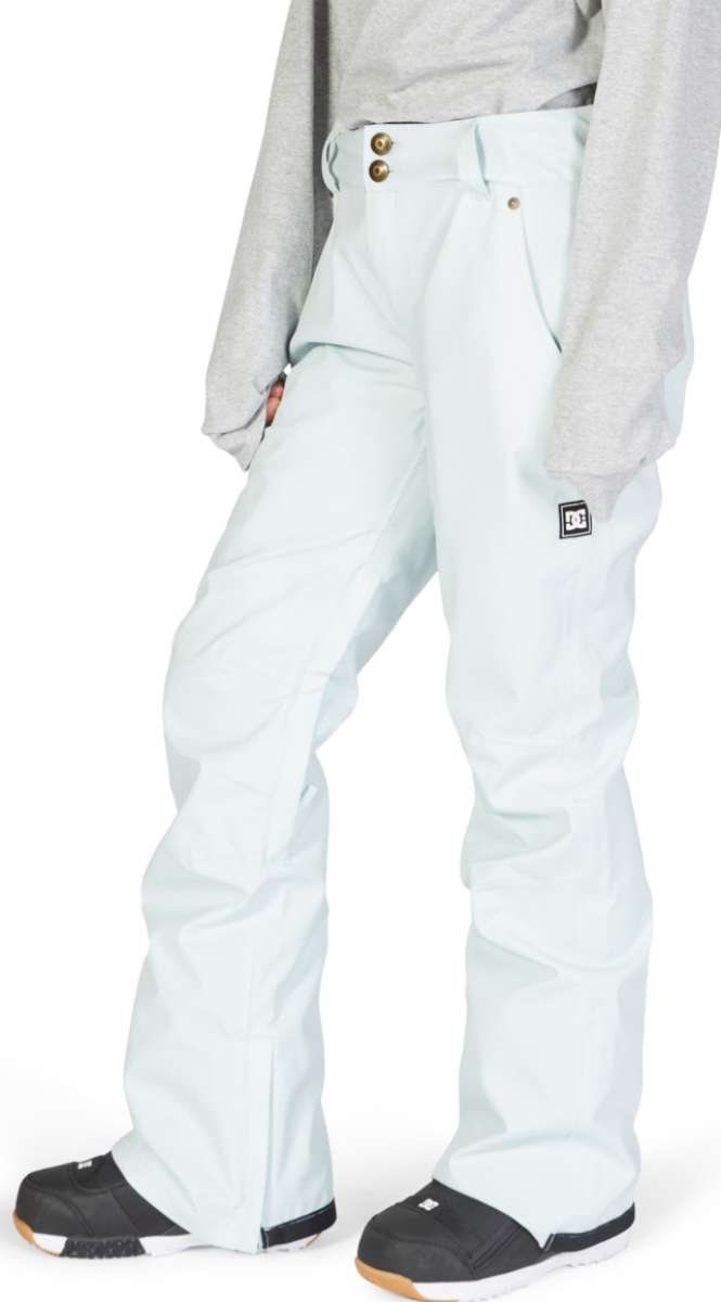 DC Women's Viva Shell Pant 2023 - Light blue snow pants with a subtle pattern of darker blue lines and white dots, featuring two gold buttons on the waistband.