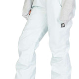 DC Women's Viva Shell Pant 2023 - Light blue snow pants with a subtle pattern of darker blue lines and white dots, featuring two gold buttons on the waistband.