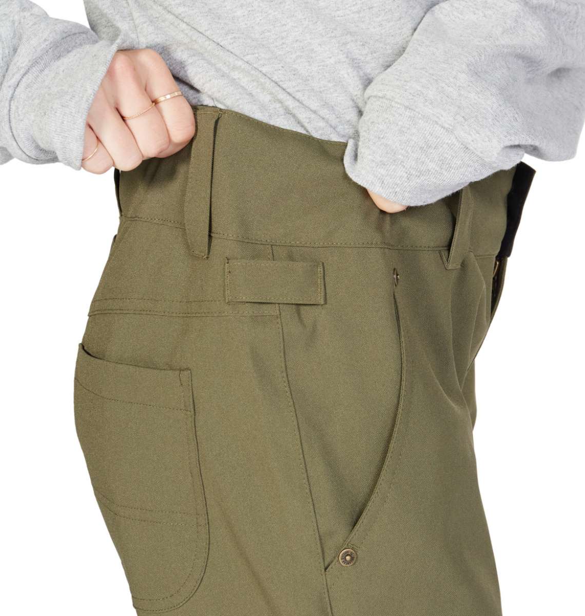 DC Women's Viva Shell Pant 2023 - A pair of olive green pants with a subtle sheen and a slightly tapered leg.