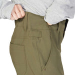 DC Women's Viva Shell Pant 2023 - A pair of olive green pants with a subtle sheen and a slightly tapered leg.