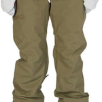 DC Women's Viva Shell Pant 2023 - Olive green pants with a subtle sheen and zippered pockets on both sides.