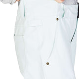 DC Women's Viva Shell Pant 2023 - White pants with a zippered pocket on the side and a small logo patch near the bottom hem.