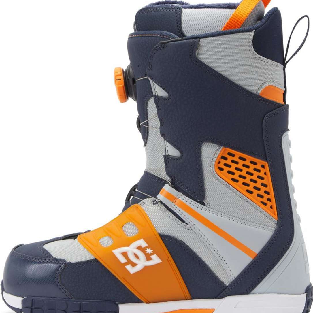DC Phantom BOA Snowboard Boots 2024 - A pair of snowboard boots with a predominantly black upper and orange accents on the toe, heel, and laces.