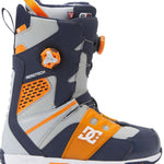 DC Phantom BOA Snowboard Boots 2024 - A pair of snowboard boots with a predominantly black upper and orange accents, featuring a white "BOA" logo on the side.
