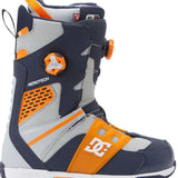 DC Phantom BOA Snowboard Boots 2024 - A pair of snowboard boots with a predominantly black upper and orange accents, featuring a white "BOA" logo on the side.