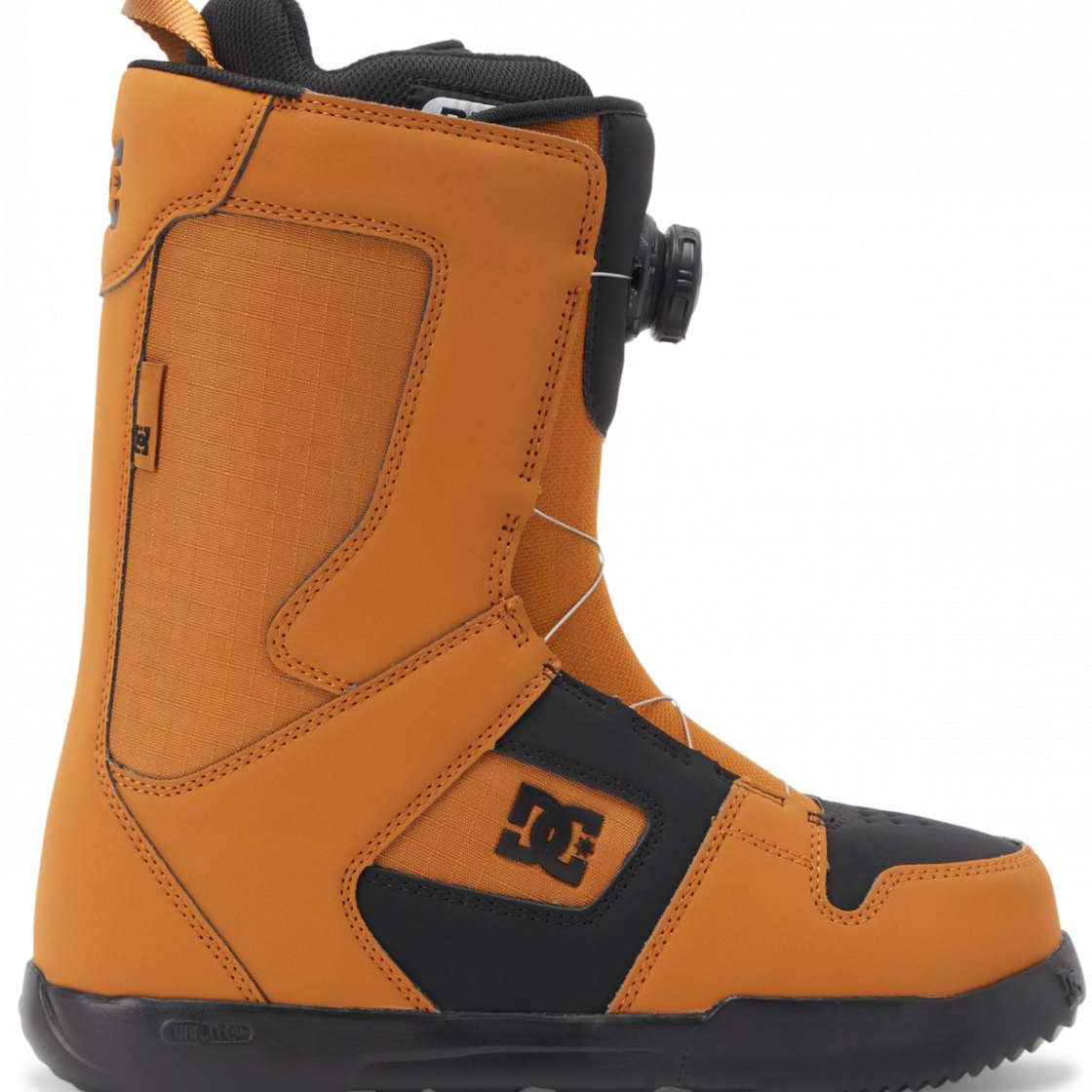 DC Phase BOA Snowboard Boots 2024 - A pair of tan snowboard boots with a black logo on the side and a black strap that goes around the ankle.