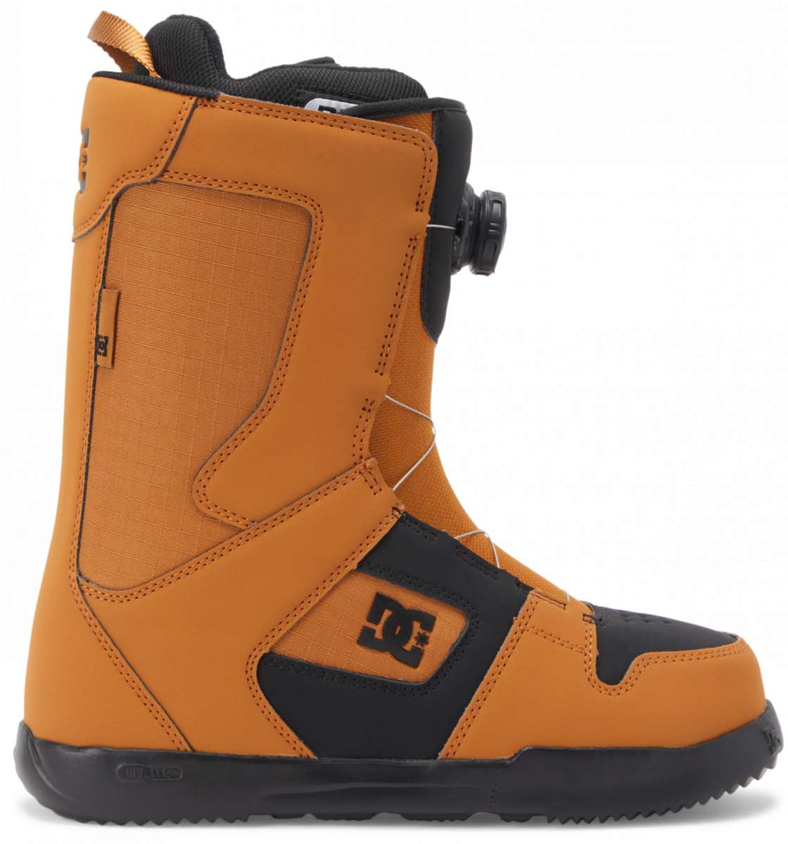 DC Phase BOA Snowboard Boots 2024 - A pair of tan snowboard boots with a black logo on the side and a black strap that goes around the ankle.