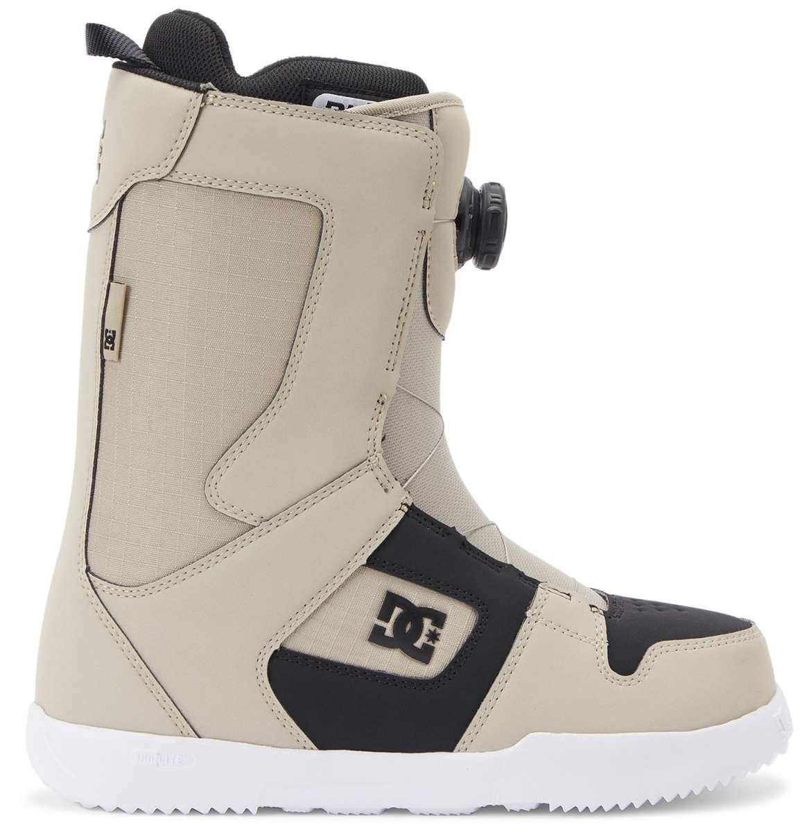 DC Phase BOA Snowboard Boots 2024 - A pair of snowboard boots with a black and white color scheme, featuring a sleek design with a prominent "DC" logo on the side.